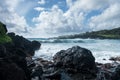 Black sand beach at Waianapanapa on the road to Hana in Maui Royalty Free Stock Photo