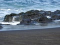 Black sand beaches rocks and waves in Tenerife Royalty Free Stock Photo