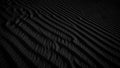 Black Sand dune. Black Sand beach macro photography. Background, texture, wave pattern of oceanic sand on the beach, black. Textur Royalty Free Stock Photo