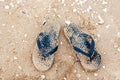 Black sandals stained with sand Royalty Free Stock Photo