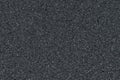 Black sandpaper texture. Abrasive material with a gritty surface Royalty Free Stock Photo