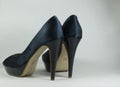 Black satin evening shoes with shiny heels Royalty Free Stock Photo