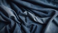 black satin fabric _A denim fabric with rips and patches. The fabric is dyed with dark blue watercolor, creating a fade