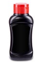 Black sauce bottle with red flip-top cap and black label isolated on white background. Mock-up for product design. Pizza, hot Royalty Free Stock Photo