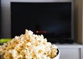 Black screen Smart TV and Popcorn bowl Royalty Free Stock Photo