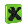 Black Screwdriver and wrench spanner tools icon isolated on transparent background. Service tool symbol. Green square