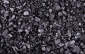 Black sea salt background. Volcanic salt in crystals.