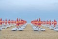 The Black Sea shore. blue sea water, clouds sunset sky, beach sand with umbrellas and sunbeds Royalty Free Stock Photo