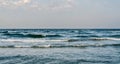 The Black Sea shore, water waves, blue sky Royalty Free Stock Photo