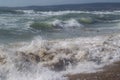 Black Sea. Summer storm. Waves lapping at the sandy beach. Royalty Free Stock Photo