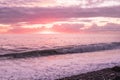 Black sea at sunset in a storm