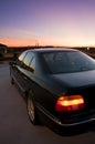 Black Sedan At Sunset