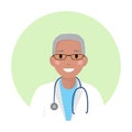 Black senior male doctor in medical white coat with glasses and stethoscope. African american physician professional Royalty Free Stock Photo