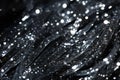 Black sequins on a dark background close-up macro photography, Close-up detail of bright silver glitter sprinkled against a dark