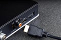 black set-top box a device for connecting to a TV next to it the hdmi