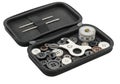 Black sewing kit case containing buttons, needles, thread, and measuring tape on white background Royalty Free Stock Photo