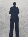 Black shadow of a man standing