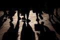 Black shadows and silhouettes of people on the street Royalty Free Stock Photo