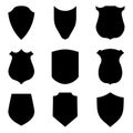 Black shield emblems isolated on white background. Security and police labels. Insignia, awards militaries. Symbol and crest of