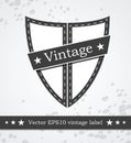 Black shield label with retro vintage styled