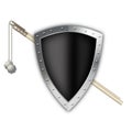Black shield with maces. Royalty Free Stock Photo