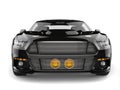 Black shiny new urban muscle car - front view closeup Royalty Free Stock Photo