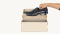 A black shoe box that can be made as a New Year gift separately on a white Royalty Free Stock Photo