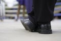 The black shoes of the boxing referee on the boxing ring.soft focus