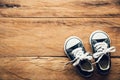 Black shoes for children on wooden floor for lifestyle Royalty Free Stock Photo