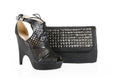 Black shoes and spiked bag Royalty Free Stock Photo