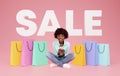 Black Shopaholic Woman Making Online Purchase On Smartphone, Pink Background Royalty Free Stock Photo