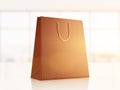 Black shopping bag in sunlit office