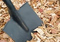 Black shovel and mulch Royalty Free Stock Photo