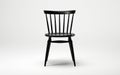 A black side chair on a white background -Generative Ai