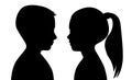 Black silhouette of boy and girl on white background. The faces are facing each other. Vector illustration of a contour of the Royalty Free Stock Photo