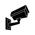 Black silhouette of a C T V security camera mounted on a white wall cctv camera surveillance camera Royalty Free Stock Photo