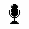 A black silhouette of a classic microphone icon Royalty Free Stock Photo