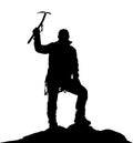 Black silhouette of climber with ice axe in hand