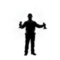 Silhouette of a construction worker holding tools Royalty Free Stock Photo