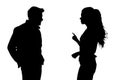 A black silhouette of a couple arguing Royalty Free Stock Photo