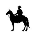 Black silhouette of cowboy on horse. Isolated image of american rider. Western landscape