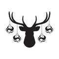 Black silhouette of deer head with antlers and with christmas tree toy balls on horns. vector flat icon isolated on white backgrou Royalty Free Stock Photo