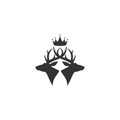 Black silhouette of deer heads with antlers and royal crown