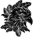black silhouette of eagle head with leaves Royalty Free Stock Photo