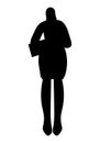 Black silhouette of a female employee standing in office holding files in hands