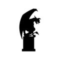 Black silhouette of gothic statue of gargoyle. Medieval architecture. Side view of stone cathedral sculpture Royalty Free Stock Photo