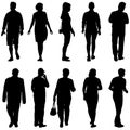 Black silhouette group of people standing in various poses Royalty Free Stock Photo