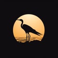 Black silhouette of a heron against a sunset background, logo concept Royalty Free Stock Photo
