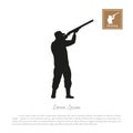 Black silhouette of a hunter on a white background. Man shooting a gun