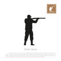 Black silhouette of a hunter on a white background. Man shooting a gun Royalty Free Stock Photo